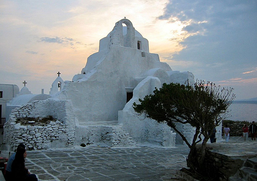 Solnedgången sedd från Panagia Paraportiani church i Mykonos stad.